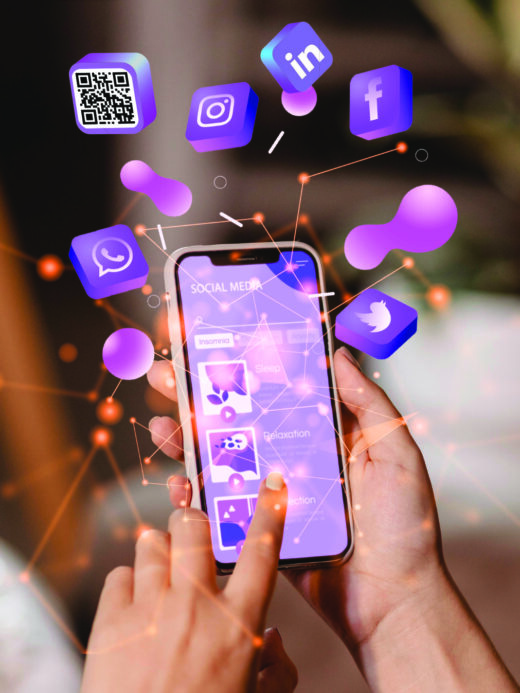 Photo showing social media icons around a mobile phone